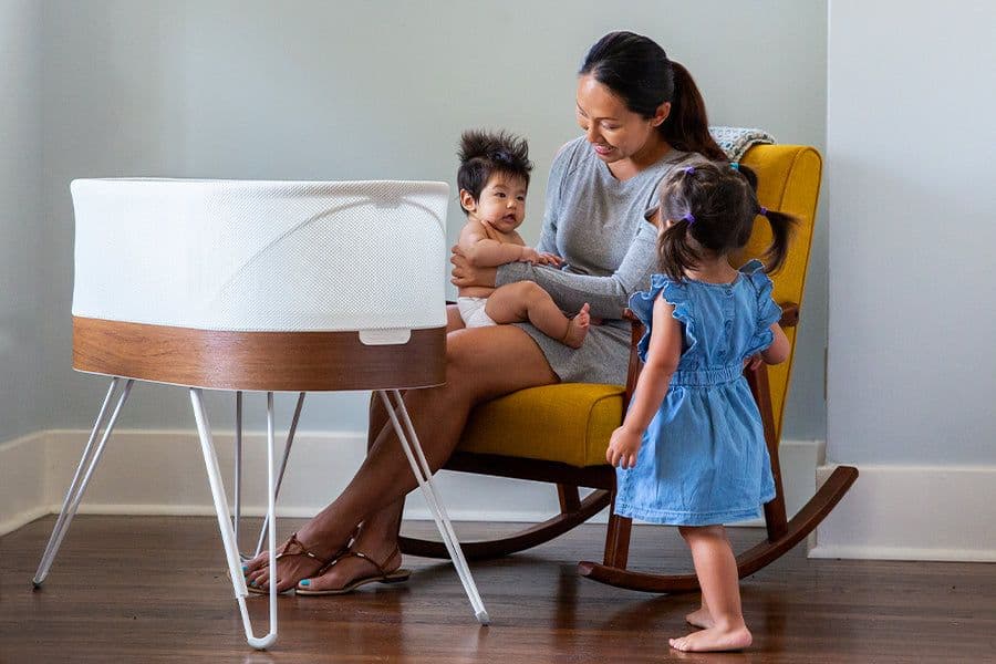 Mom, baby, toddler and SNOO