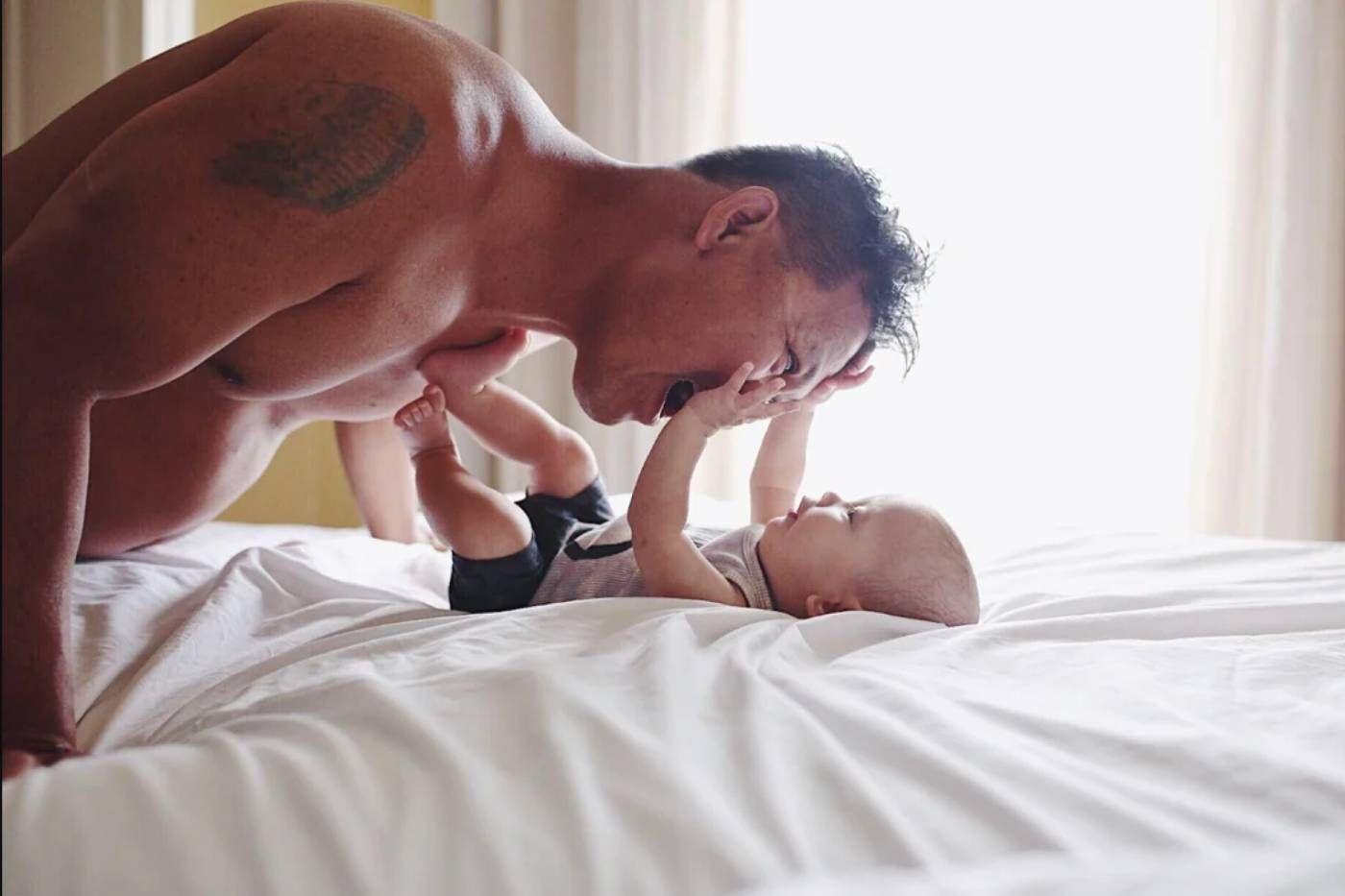 dad bonding with infant