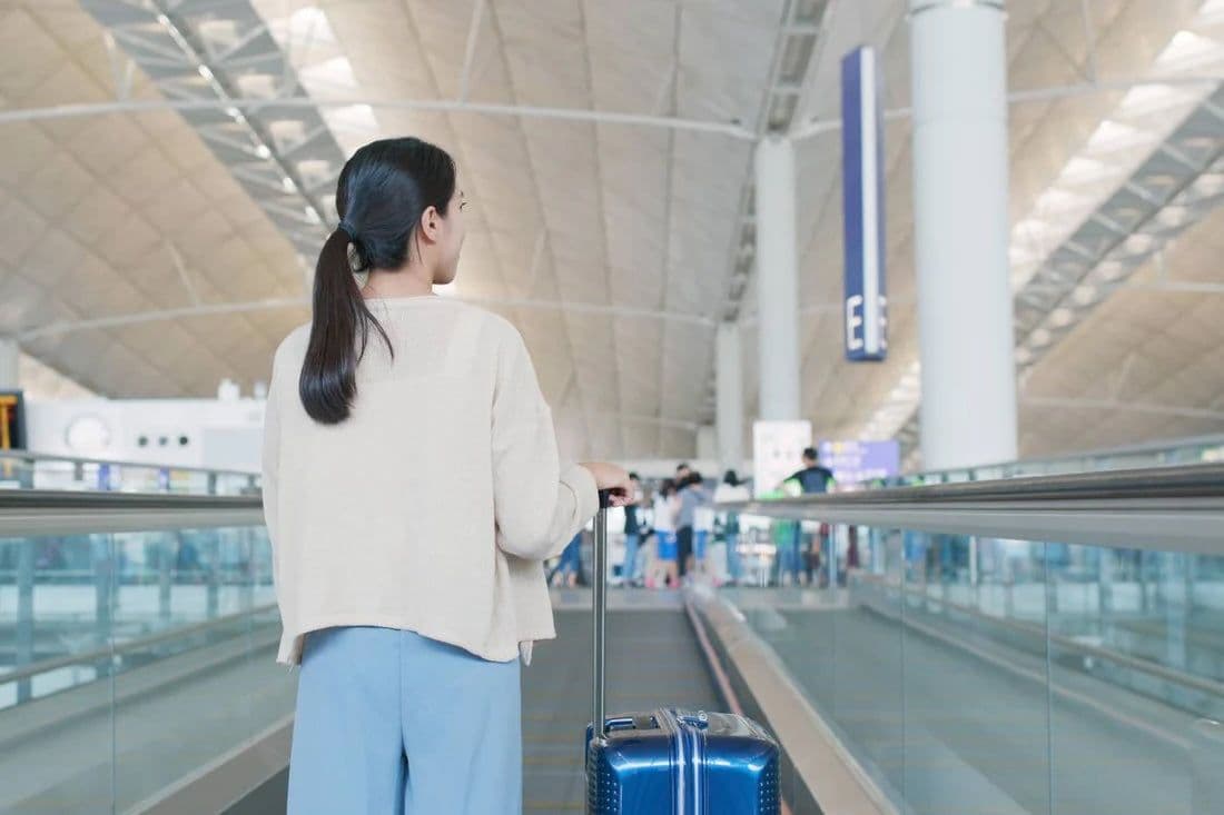 Pregnant woman at the airport