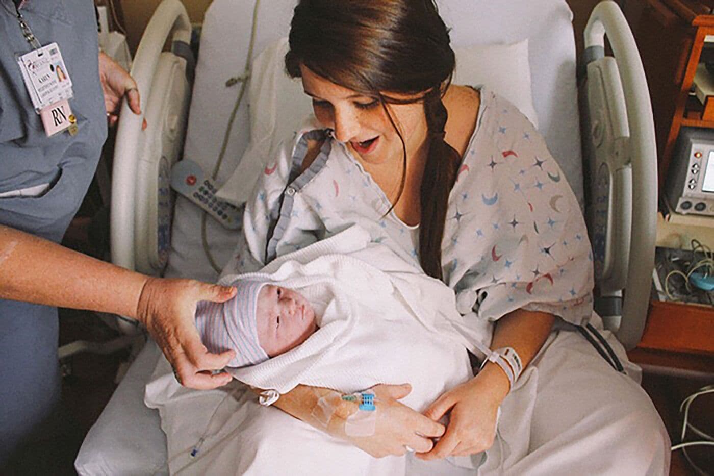 mom-holding-newborn-baby