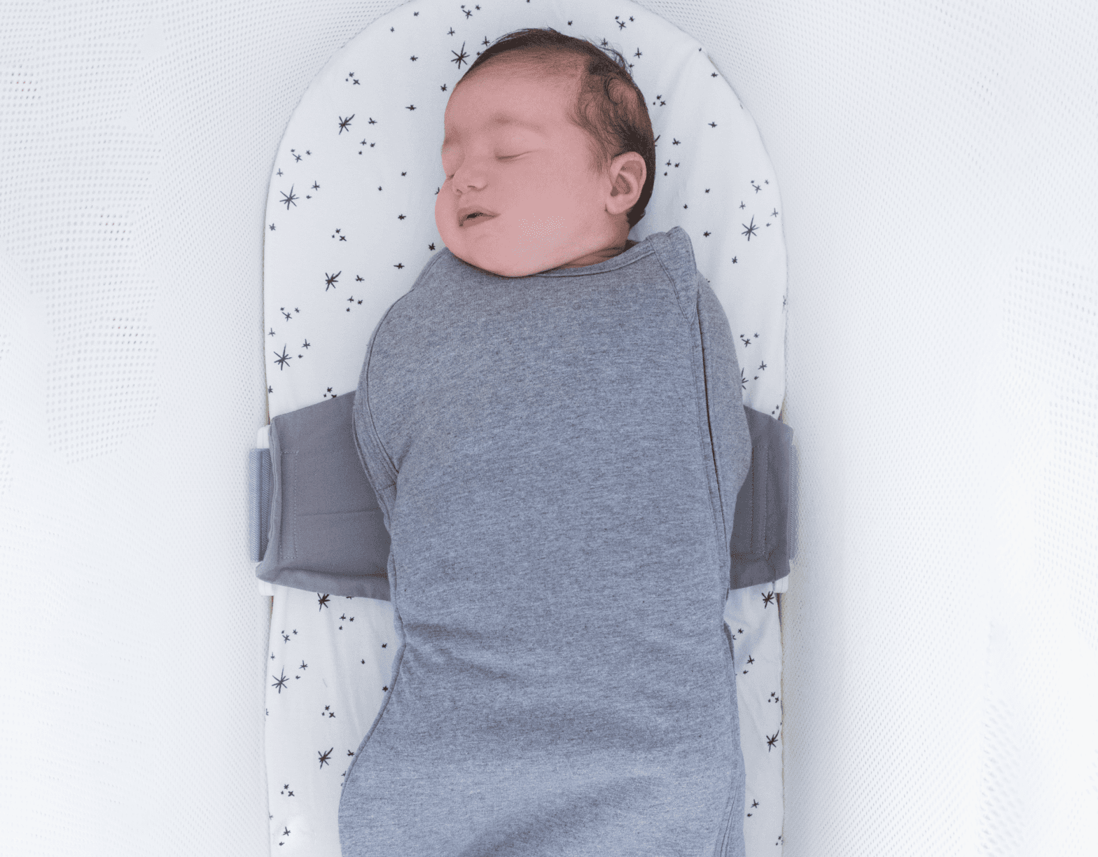 Picture of a Baby sleeping in Comforter Sack